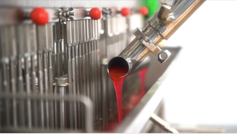 Liquid gummy blend entering a depositing line