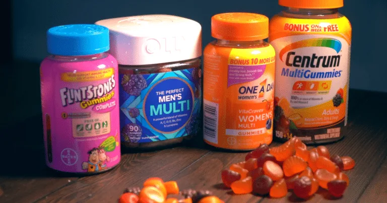 Branded gummy vitamin bottles with loose gummies in front